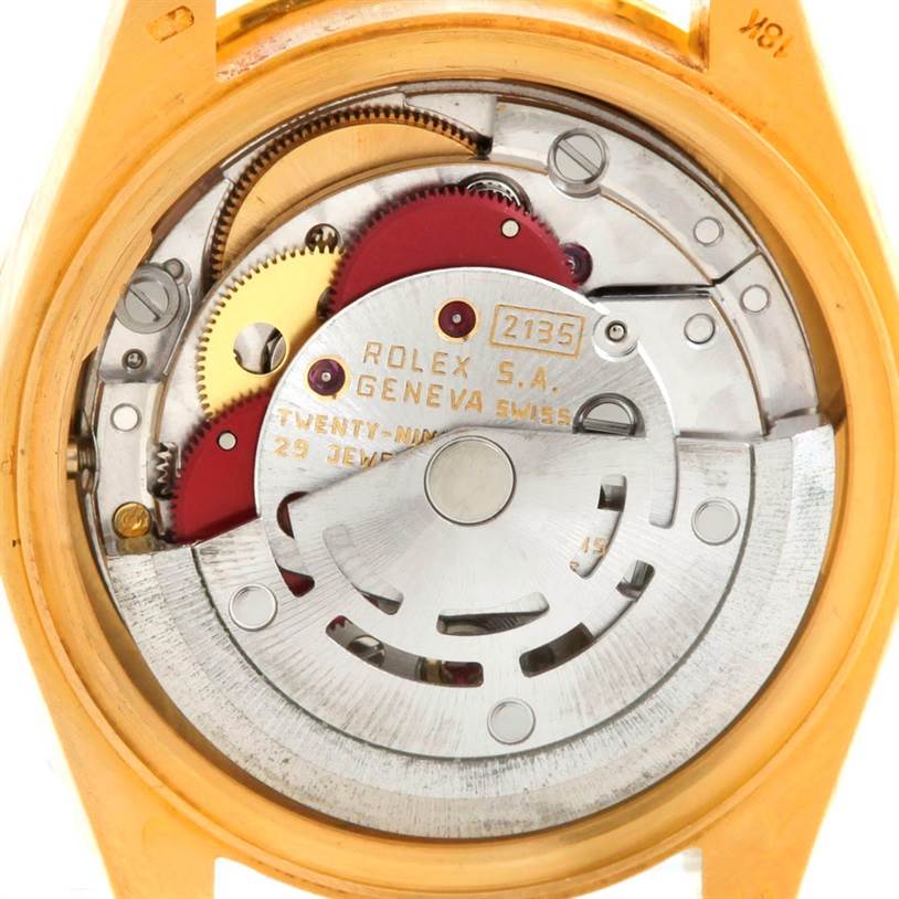 This image shows the inner mechanical movement of a Rolex President 69158 Women's Yellow Gold Black Dial 69158 Women's Yellow Gold Black Dial model watch from a back angle.