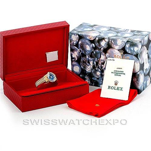 The image shows a Rolex President 69088 Women's Yellow Gold Blue Dial 69088 Women's Yellow Gold Blue Dial model watch in its box, along with the outer box, manual, and protective cloth.