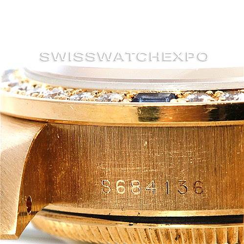 This image shows a close-up of the side of a Rolex President 69088 Women's Yellow Gold Blue Dial 69088 Women's Yellow Gold Blue Dial watch, focusing on the model number engraving and part of the bezel.