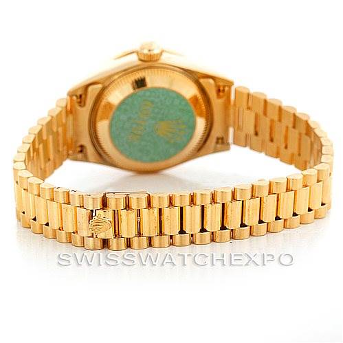 This is an image of the back view of a Rolex President 69198 Women's Yellow Gold Blue Dial 69198 Women's Yellow Gold Blue Dial model watch, showing the bracelet and case back.