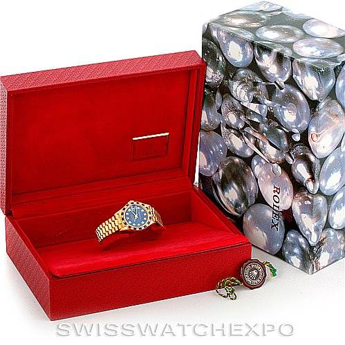 The Rolex President 69198 Women's Yellow Gold Blue Dial 69198 Women's Yellow Gold Blue Dial model watch is displayed inside an open red box, with its outer box visible on the right.