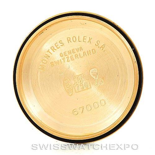 This image shows the inside of a Rolex President 67198 Women's Yellow Gold Champagne Dial 67198 Women's Yellow Gold Champagne Dial model watch case back, with engraved details.