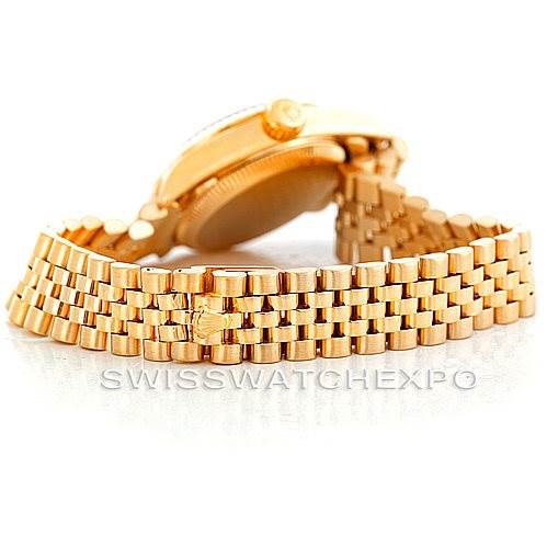 This image shows a side view of the Rolex President 67198 Women's Yellow Gold Champagne Dial 67198 Women's Yellow Gold Champagne Dial model, highlighting its gold bracelet and clasp.