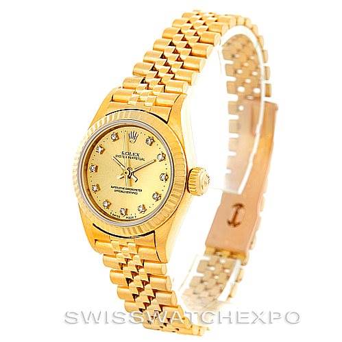 The image shows a Rolex President 67198 Women's Yellow Gold Champagne Dial 67198 Women's Yellow Gold Champagne Dial model watch at a slight angle, highlighting the gold case, diamond hour markers, and jubilee bracelet.