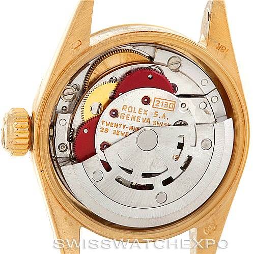 This image displays the movement and inner workings of a Rolex President 67198 Women's Yellow Gold Champagne Dial 67198 Women's Yellow Gold Champagne Dial model watch from the back.