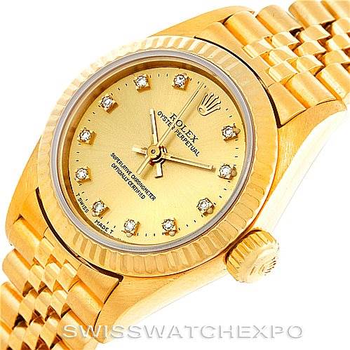 The image shows a Rolex President 67198 Women's Yellow Gold Champagne Dial 67198 Women's Yellow Gold Champagne Dial model watch from a top angle, highlighting the dial, bezel, crown, and part of the bracelet.