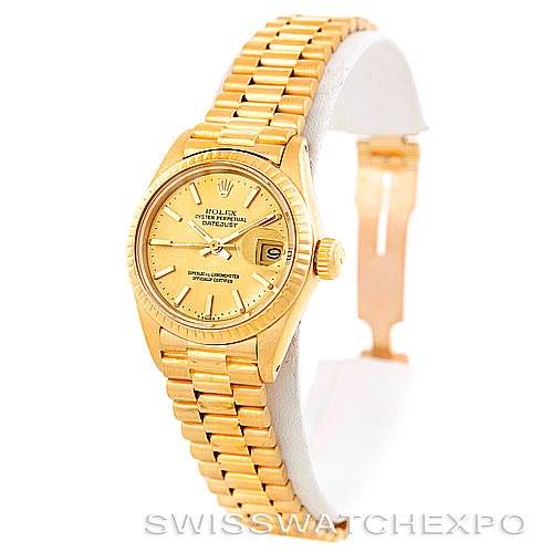 The image shows a Rolex President 6917 Women's Yellow Gold Champagne Dial 6917 Women's Yellow Gold Champagne Dial model watch at a three-quarter angle, highlighting the gold case, dial, and bracelet.