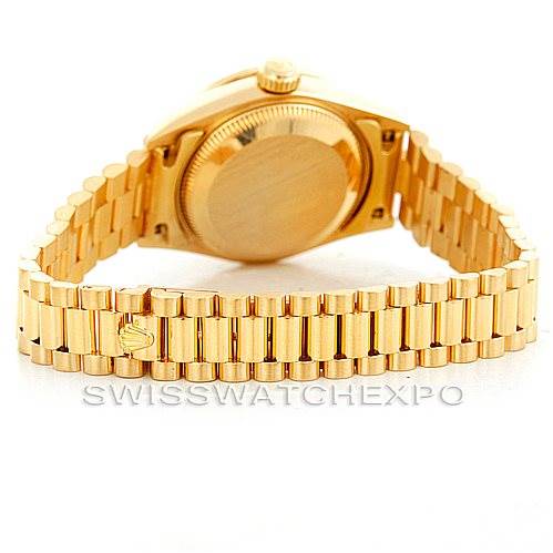 The image shows the back view of a Rolex President 69178 Women's Yellow Gold Black Dial 69178 Women's Yellow Gold Black Dial model watch, highlighting the band and clasp.