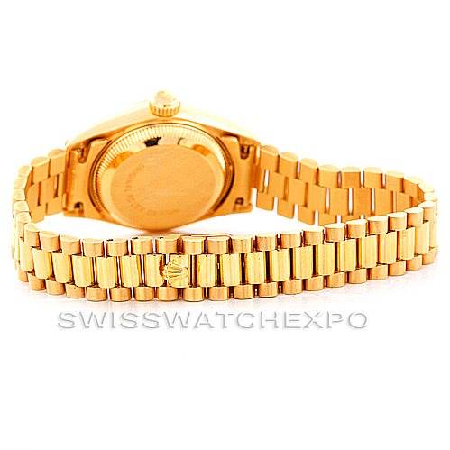 The image shows the back case and President bracelet of a Rolex President 69238 Women's Yellow Gold Champagne Dial 69238 Women's Yellow Gold Champagne Dial model watch.
