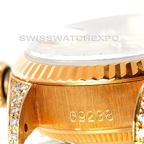 This image shows a close-up side view of the Rolex President 69238 Women's Yellow Gold Champagne Dial 69238 Women's Yellow Gold Champagne Dial watch case, highlighting the gold finish and the model number 69238.