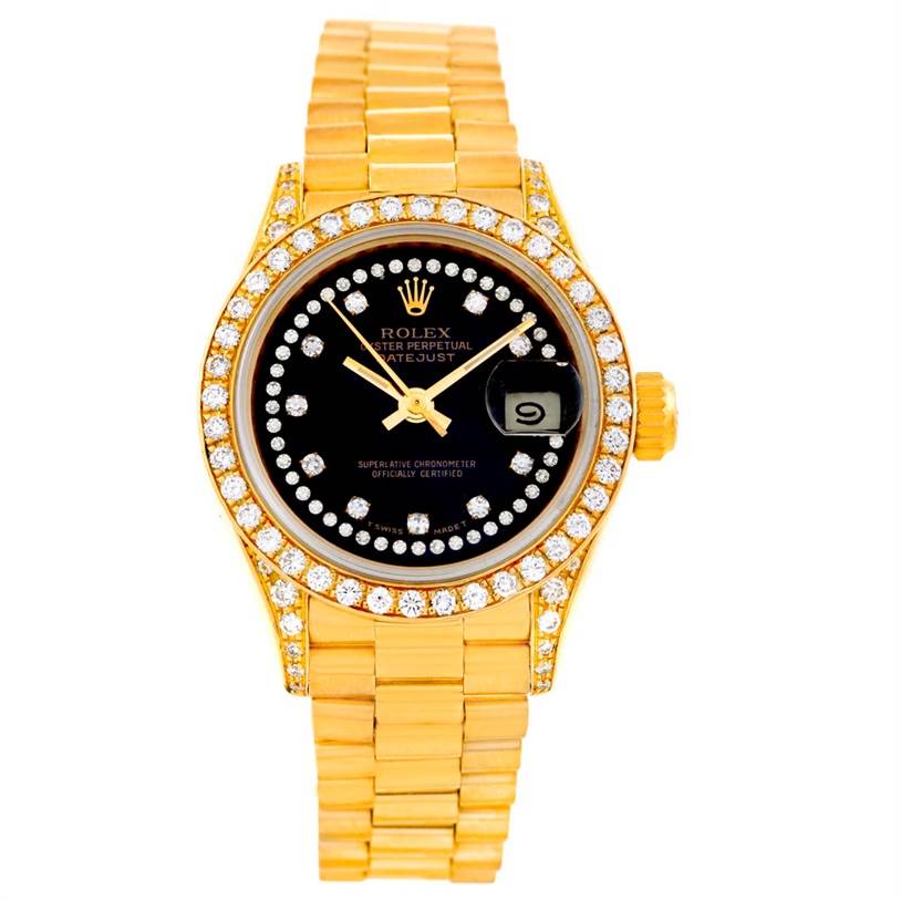 The image shows a Rolex President 69158 Women's Yellow Gold Black Dial 69158 Women's Yellow Gold Black Dial model watch head-on, highlighting its gold bracelet, diamond bezel, and black dial with date display.