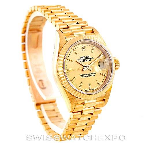 This image shows a Rolex President 69178 Women's Yellow Gold Champagne Dial 69178 Women's Yellow Gold Champagne Dial model watch at an angle highlighting its gold bracelet and dial.