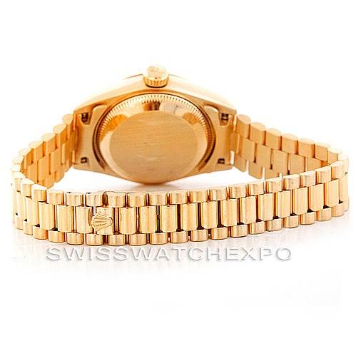 The image shows the back view of a Rolex President 69178 Women's Yellow Gold Champagne Dial 69178 Women's Yellow Gold Champagne Dial model watch, highlighting the case back and bracelet.