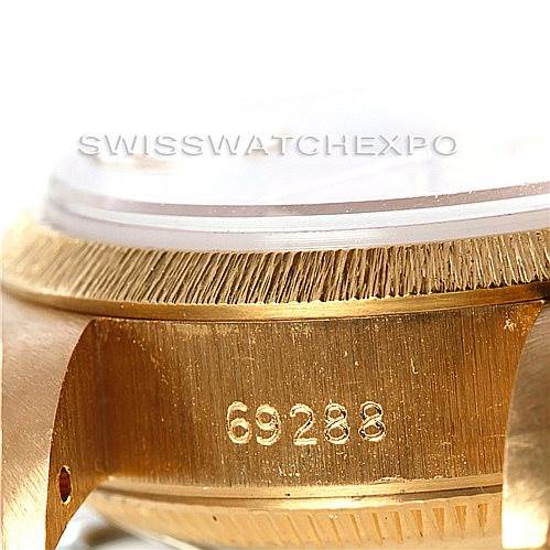 This close-up image shows the side view of a Rolex President 69278 Women's Yellow Gold Champagne Dial 69278 Women's Yellow Gold Champagne Dial watch case, focusing on the engraved model number "69288."