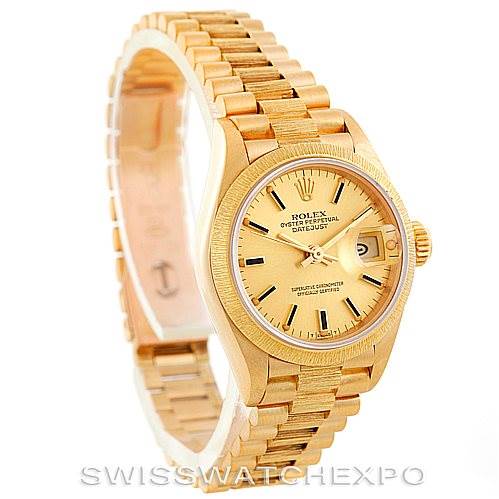 The Rolex President 69278 Women's Yellow Gold Champagne Dial 69278 Women's Yellow Gold Champagne Dial watch is shown at a three-quarter angle highlighting the face, bezel, and part of the bracelet.