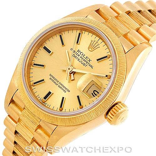 The image shows a Rolex President 69278 Women's Yellow Gold Champagne Dial 69278 Women's Yellow Gold Champagne Dial model watch at an angled view, highlighting its dial, bezel, crown, and gold bracelet.