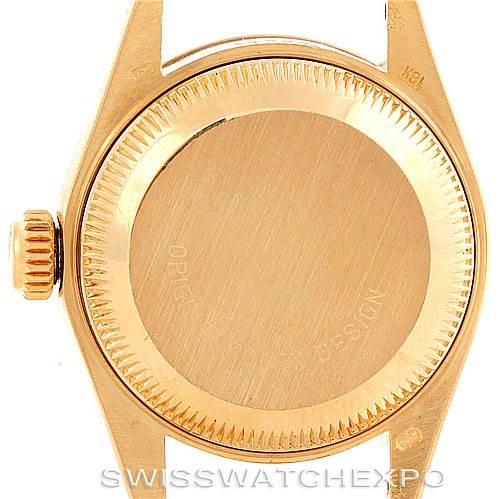 The image shows the back case and crown of a Rolex President 69278 Women's Yellow Gold Champagne Dial 69278 Women's Yellow Gold Champagne Dial model watch, viewed from the rear.