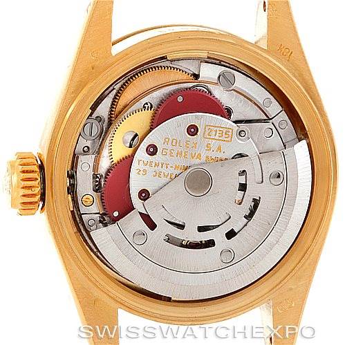 The image shows the internal mechanism of a Rolex President 69278 Women's Yellow Gold Champagne Dial 69278 Women's Yellow Gold Champagne Dial model watch from a rear angle, highlighting the movement components.