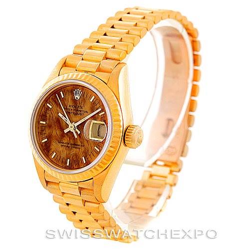 This image shows a side angle of the Rolex President 69178 Women's Yellow Gold Brown Dial 69178 Women's Yellow Gold Brown Dial model watch, highlighting its gold bracelet and brown dial.