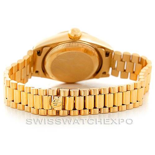 This image shows the back view of a Rolex President 69178 Women's Yellow Gold Brown Dial 69178 Women's Yellow Gold Brown Dial model watch, focusing on the gold bracelet and case back.