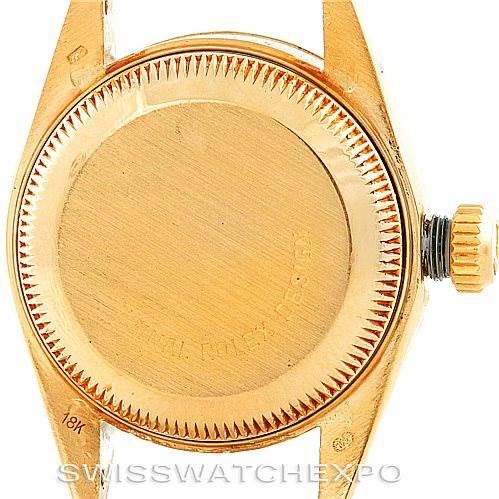 This image shows the case back and crown of a Rolex President 69178 Women's Yellow Gold Brown Dial 69178 Women's Yellow Gold Brown Dial model from a bottom-up angle.
