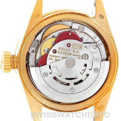 The image shows the back view of a Rolex President 69088 Women's Yellow Gold Blue Dial 69088 Women's Yellow Gold Blue Dial model, highlighting the inner mechanical components.