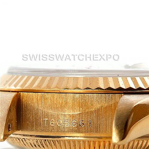 This image shows a close-up, side view of the case and bezel of a Rolex President 69178 Women's Yellow Gold Champagne Dial 69178 Women's Yellow Gold Champagne Dial model watch.