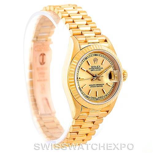 The image shows a side angle of the gold Rolex President 69178 Women's Yellow Gold Champagne Dial 69178 Women's Yellow Gold Champagne Dial model, highlighting the watch face, bezel, bracelet, and crown.