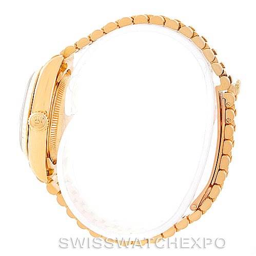 The image shows a side profile of the Rolex President 69178 Women's Yellow Gold Champagne Dial 69178 Women's Yellow Gold Champagne Dial model watch, highlighting the crown and part of the bracelet.