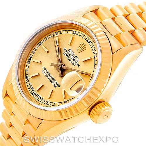 The image shows the Rolex President 69178 Women's Yellow Gold Champagne Dial 69178 Women's Yellow Gold Champagne Dial model watch at an angled view, highlighting the gold bracelet, bezel, dial, hands, and crown.