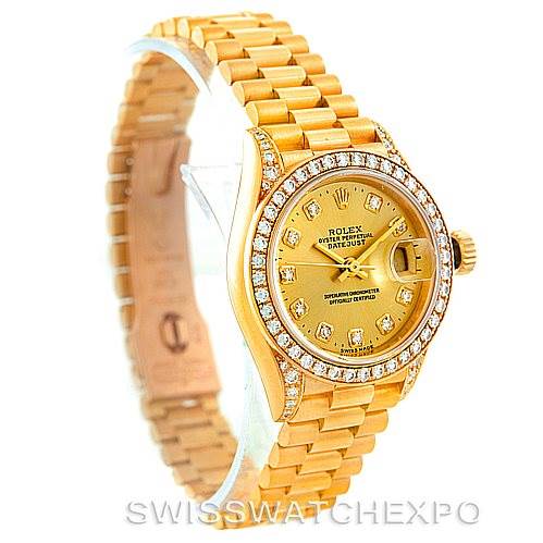 This image shows a Rolex President 69158 Women's Yellow Gold Champagne Dial 69158 Women's Yellow Gold Champagne Dial model watch from an angled perspective, highlighting the face, bezel, band, and crown.