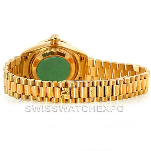 This image shows the rear view of the Rolex President 69158 Women's Yellow Gold Champagne Dial 69158 Women's Yellow Gold Champagne Dial model, displaying the case back and the distinctive gold bracelet.