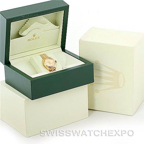 The image shows a Rolex President 69178 Women's Yellow Gold Champagne Dial 69178 Women's Yellow Gold Champagne Dial model watch in its open green and cream box, with surrounding packaging visible.