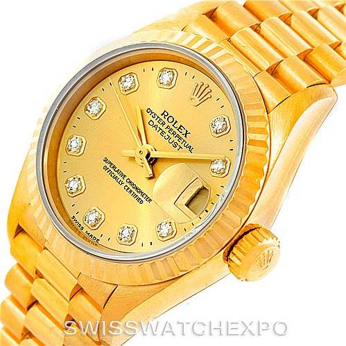 This image shows a close-up angle of the Rolex President 69178 Women's Yellow Gold Champagne Dial 69178 Women's Yellow Gold Champagne Dial model, featuring its dial, bezel, crown, and part of the bracelet.