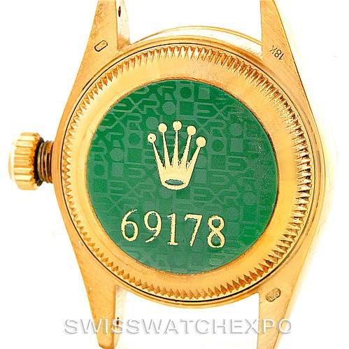 This image shows the back case and crown of a Rolex President 69178 Women's Yellow Gold Champagne Dial 69178 Women's Yellow Gold Champagne Dial model watch, displaying the model number 69178.
