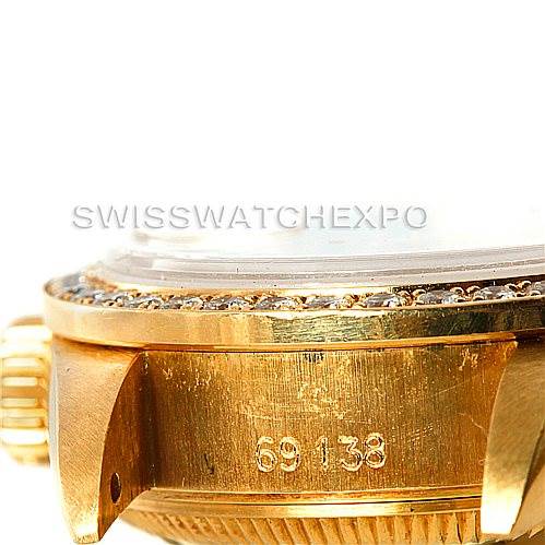 This image shows a side view of the casing and serial number of a Rolex President 69138 Women's Yellow Gold Champagne Dial 69138 Women's Yellow Gold Champagne Dial model watch.