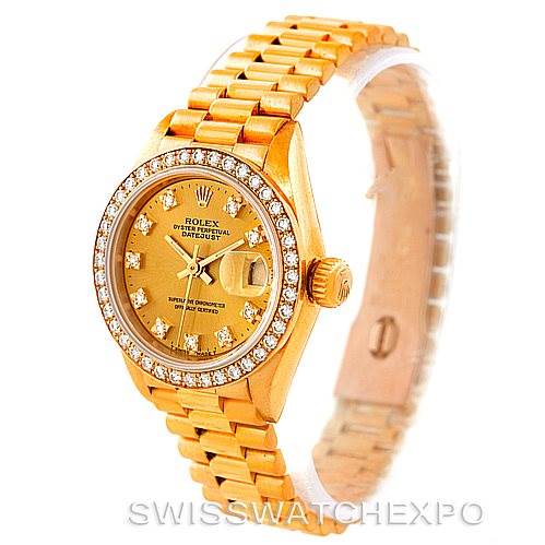 This image shows a Rolex President 69138 Women's Yellow Gold Champagne Dial 69138 Women's Yellow Gold Champagne Dial model watch at a three-quarter angle, highlighting its gold bracelet, bezel, and diamond-encrusted dial.