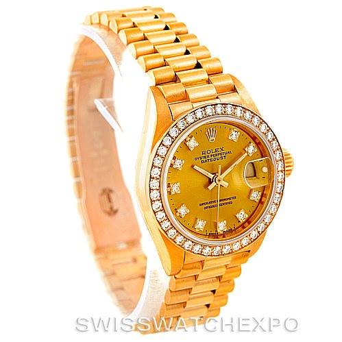 The image shows a Rolex President 69138 Women's Yellow Gold Champagne Dial 69138 Women's Yellow Gold Champagne Dial model watch from an angled side view, highlighting the dial, bezel, and part of the bracelet.
