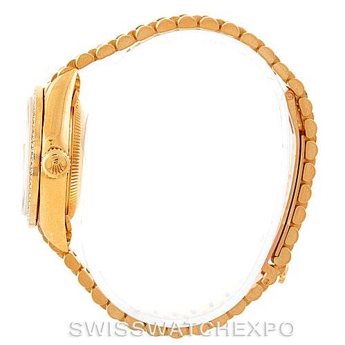 The image shows a side view of the Rolex President 69138 Women's Yellow Gold Champagne Dial 69138 Women's Yellow Gold Champagne Dial model, highlighting the crown and bracelet links.