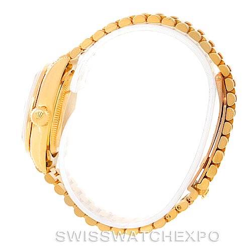 The image shows a side profile of a Rolex President 79158 Women's Yellow Gold  79158 Women's Yellow Gold  model, highlighting the gold case, crown, and part of the bracelet.
