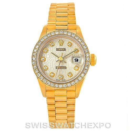The Rolex President 69138 Women
s Yellow Gold Beige Dial 69138 Women
s Yellow Gold Beige Dial model watch is shown from a front angle, highlighting its dial, bezel, bracelet, and crown.