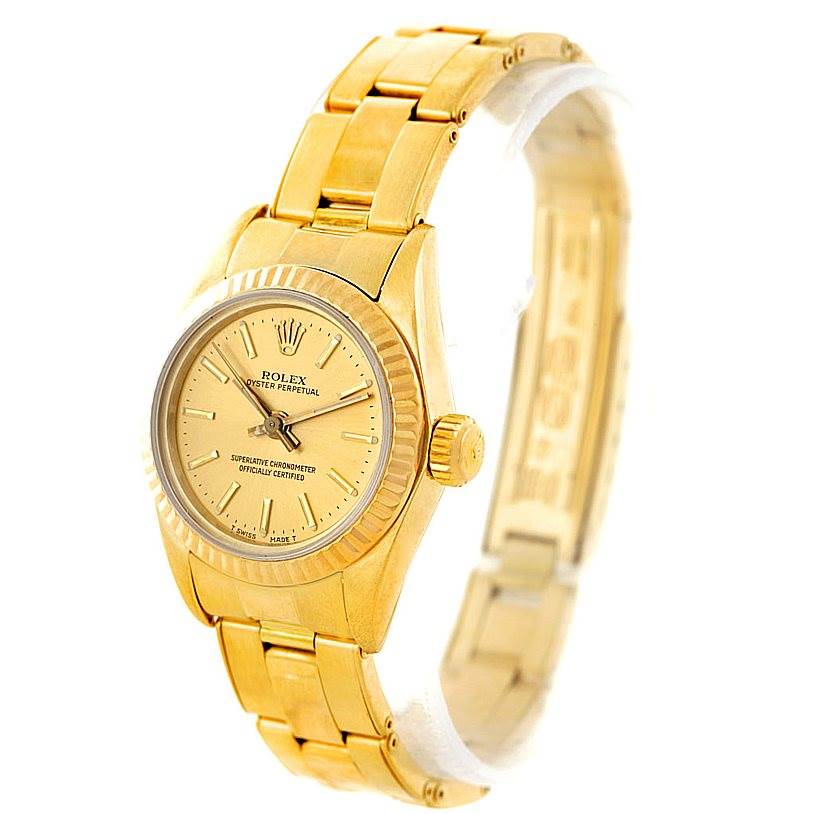 The image shows a side and partial front view of a Rolex President 67197 Women's Yellow Gold Champagne Dial 67197 Women's Yellow Gold Champagne Dial model watch, highlighting its gold case and bracelet.