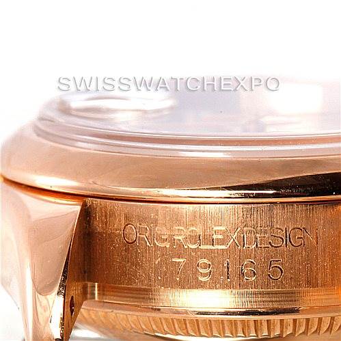 This image shows a side view of a Rolex President 179165 Women's Rose Gold Pink Dial 179165 Women's Rose Gold Pink Dial model's case, highlighting the engraving on its side.