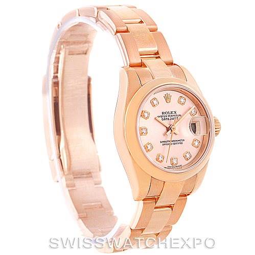 The Rolex President 179165 Women's Rose Gold Pink Dial 179165 Women's Rose Gold Pink Dial model watch is shown from a three-quarter angle, highlighting its dial, case, and bracelet.