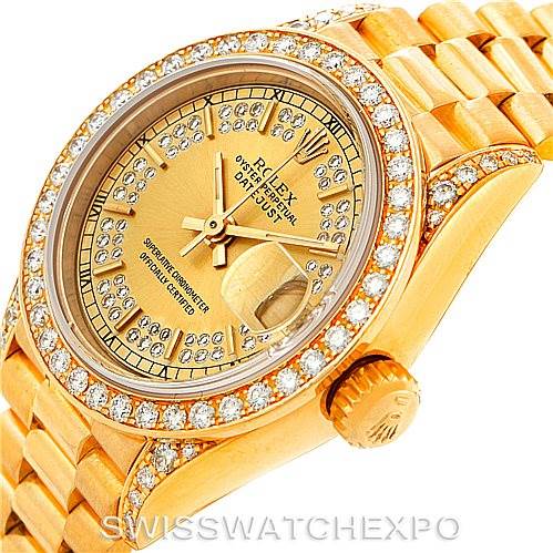 This image shows the dial, bezel, and part of the bracelet of a Rolex President 69158 Women's Yellow Gold Champagne Dial 69158 Women's Yellow Gold Champagne Dial model watch, viewed at an angle.