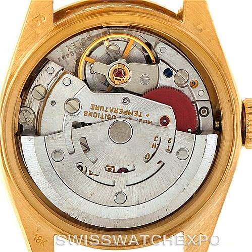 The image shows the internal mechanism of a Rolex President 69158 Women's Yellow Gold Champagne Dial 69158 Women's Yellow Gold Champagne Dial model watch, including gears and the rotor, from a back angle without its case back.