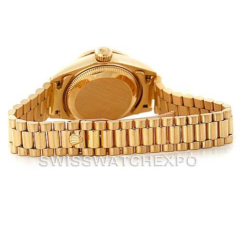 This image shows the backside and bracelet of a Rolex President 69158 Women's Yellow Gold Champagne Dial 69158 Women's Yellow Gold Champagne Dial model watch from a rear view angle.
