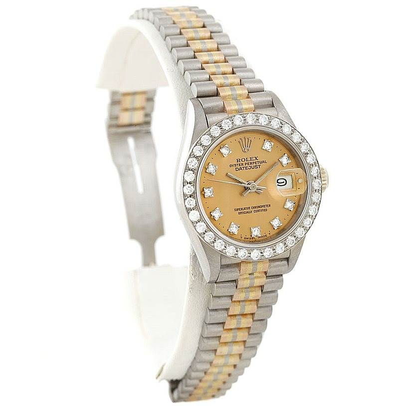 The Rolex President 69179B Women's White Gold Brown Dial 69179B Women's White Gold Brown Dial watch is shown from a three-quarter angle, highlighting the face, bezel, and bracelet.