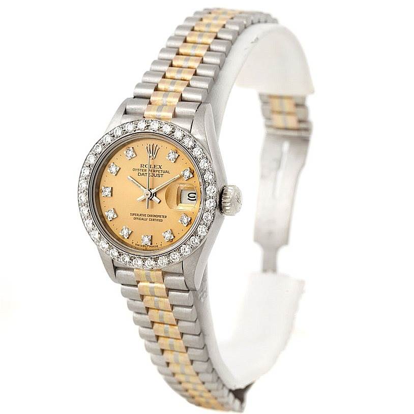 The image shows a Rolex President 69179B Women's White Gold Brown Dial 69179B Women's White Gold Brown Dial watch at an angle displaying the face, bezel with diamonds, crown, and two-tone bracelet.