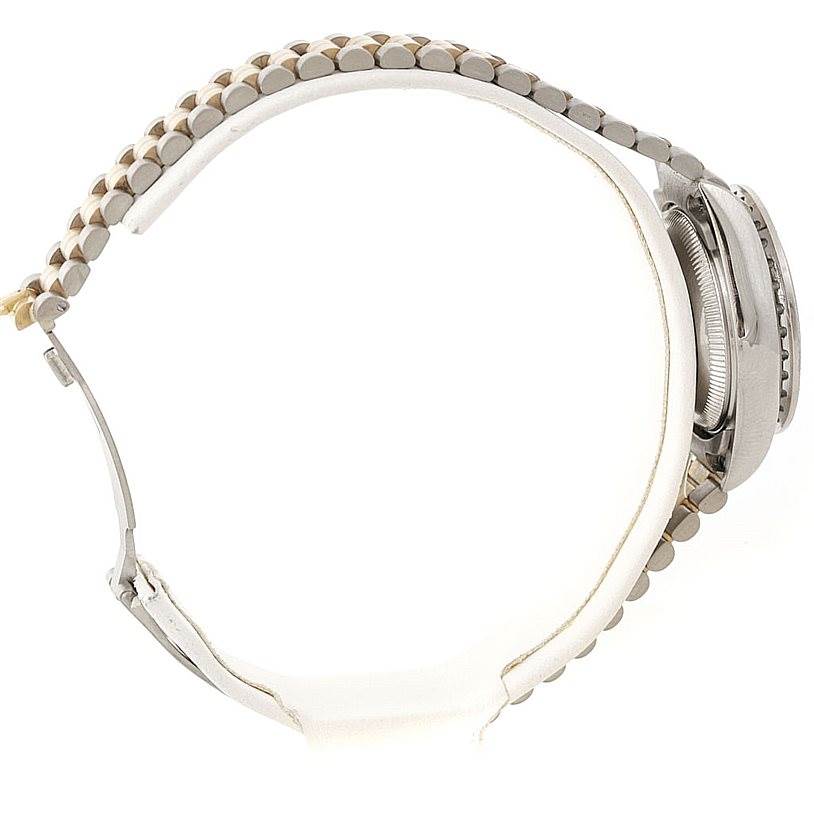 This side-angle view of the Rolex President 69179B Women's White Gold Brown Dial 69179B Women's White Gold Brown Dial model watch shows the bracelet and case, highlighting its band design and case thickness.